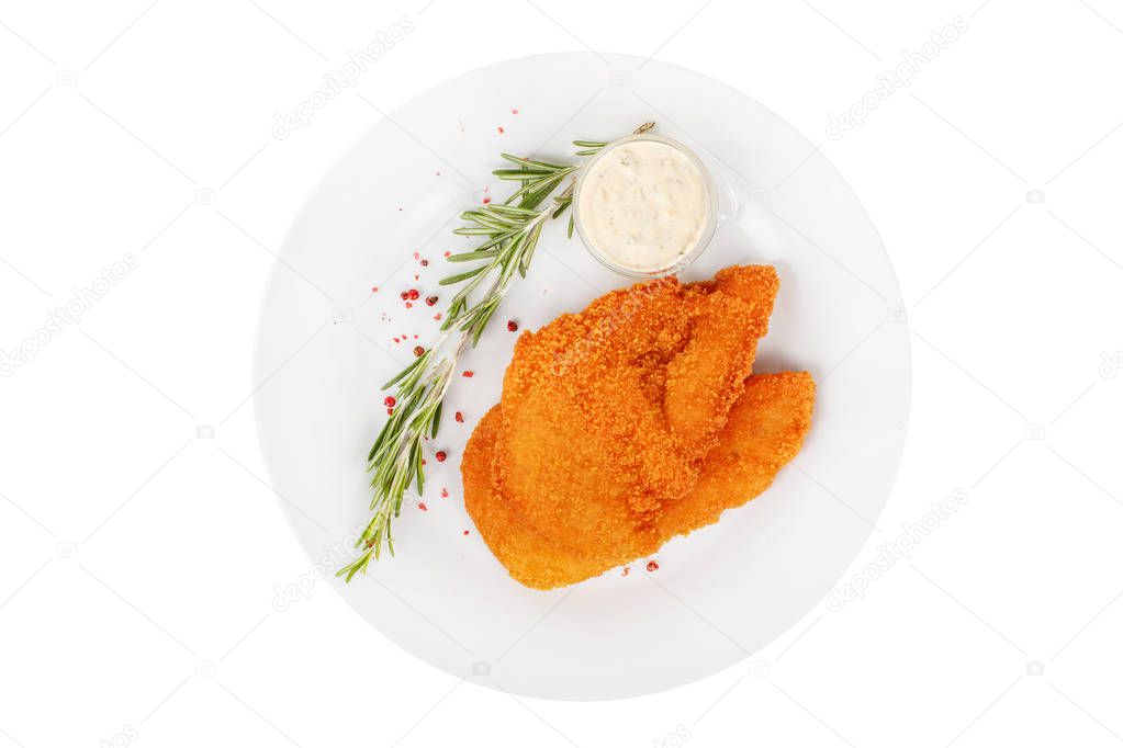Schnitzel with white sauce and rosemary isolated