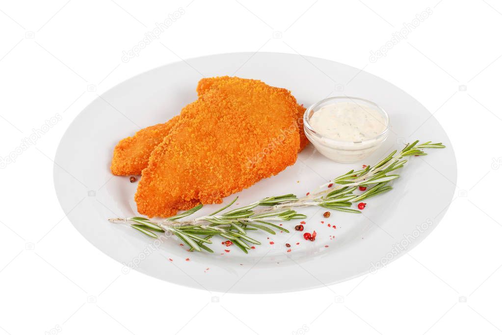 Schnitzel with white sauce and rosemary isolated