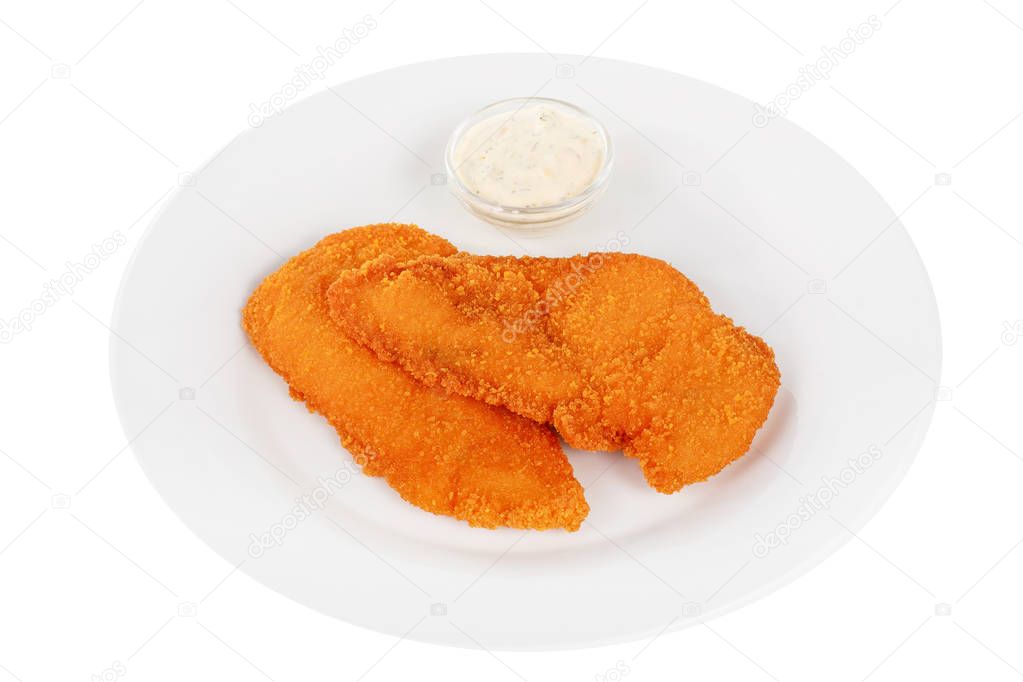 Schnitzel with white sauce on a plate isolated
