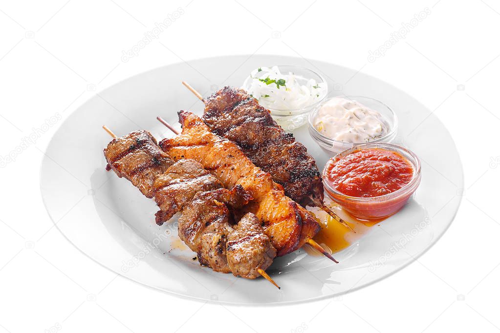 Assorted shish kebab plate isolated on white