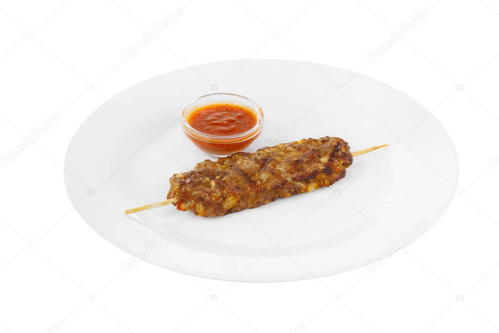 Kebab meat with sauce isolated without garnish