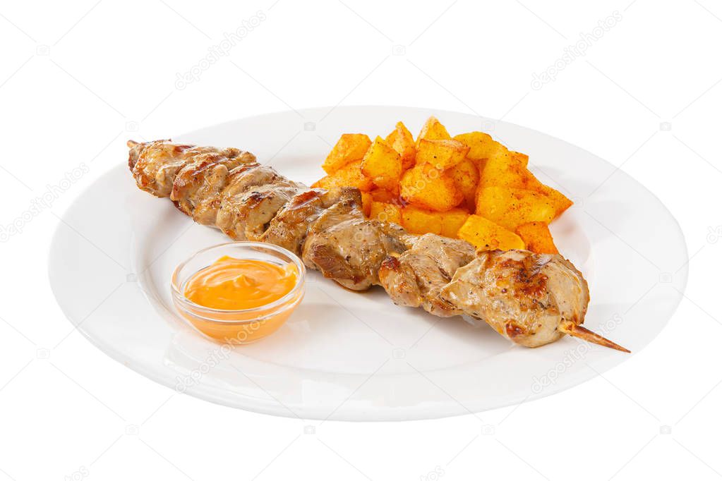 Shish kebab with sauce isolated with potato
