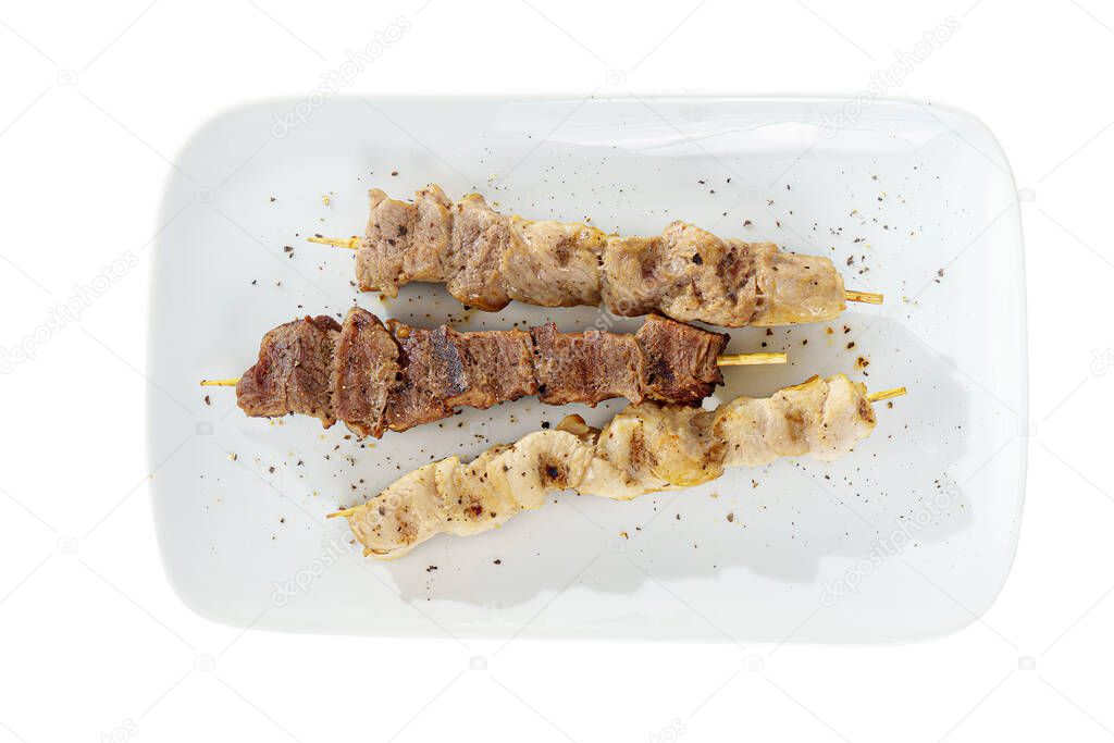 Assorted shish kebab, souvlaki plate isolated on white