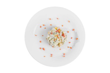 salad with corn and bell pepper on plate white isolated