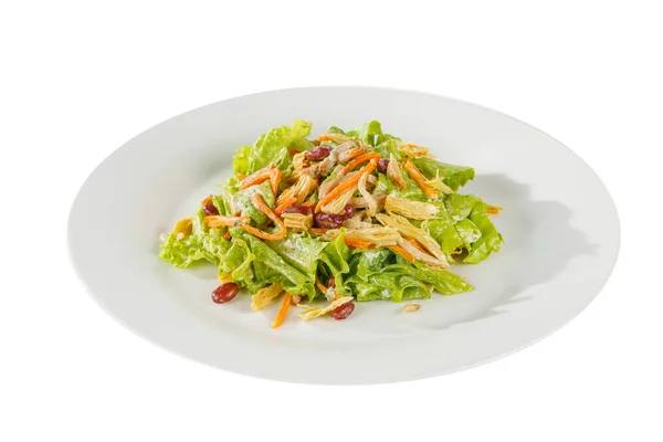 Salad with beans and asparagus on plate white isolated — Stockfoto