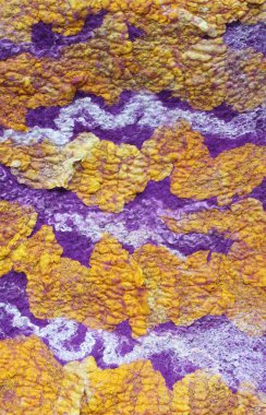 Sarı, mor ve beyaz bela kumaş dokusu