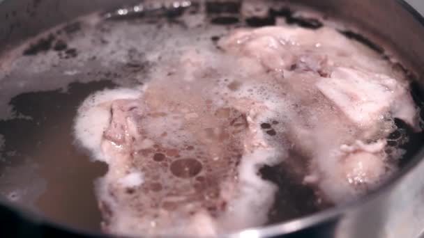 Chicken soup boiling in a pot close-up. Home diet food concept. Cooking homemade food — Stock Video