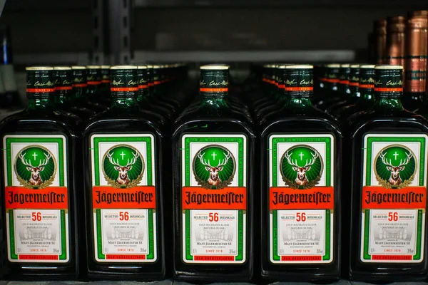 Tyumen, russia-november 05, 2019: bottle of Jagermeister, German diisestif made with 56 herbs and specifications, the flagship product of mast — 스톡 사진