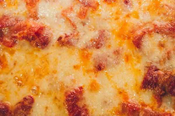 pizza texture, food background close-up macro