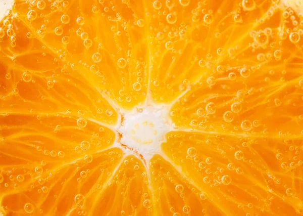 Narancs gyümölcs közeli makró, háttér textúra. egészséges táplálkozás. gyümölcslé, szelektív fókusz — Stock Fotó
