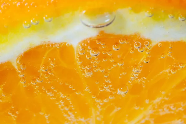 Fruta laranja fechar macro, textura de fundo. dieta saudável. fruto de suco, foco seletivo — Fotografia de Stock