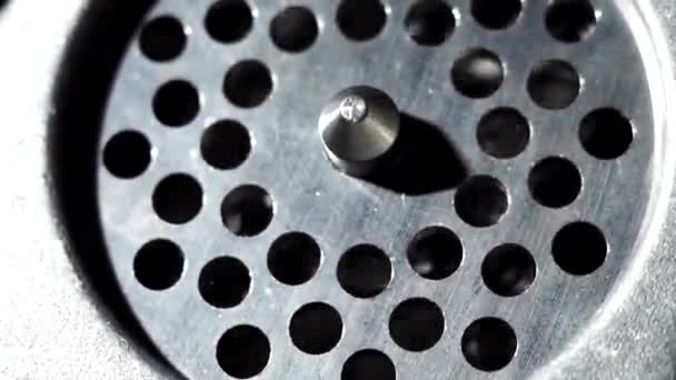Meat grinder close up. metal grating close-up shot of rotating knives, electric meat grinder — Stock Video