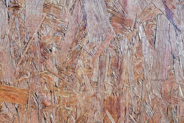 Painel de madeira prensado fundo, textura sem costura orientada Board-OSB. de perto — Fotografia de Stock