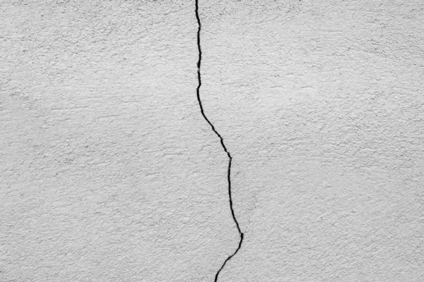 Crack in the concrete wall close-up. grunge background — Stock Photo, Image