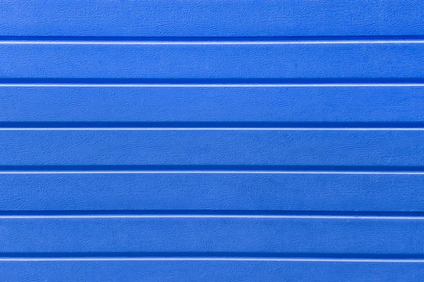 Blaue Textur Kunststofflinien, horizontal. Hintergrund, Zaun, Oberfläche. — Stockfoto