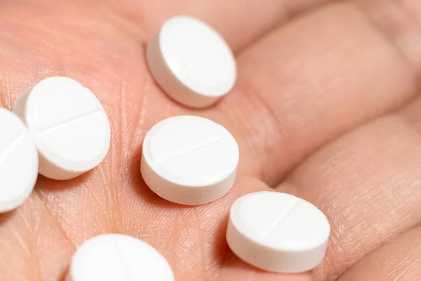 Close-up pills in hand, medicine, aspirin, medication — Stock Photo, Image
