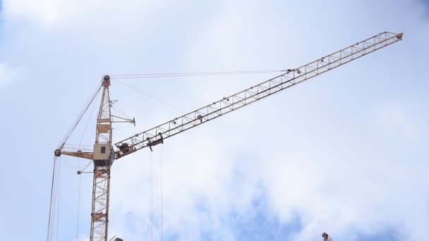 Huge construction crane. construction of multi-storey buildings in Russia — Stock video