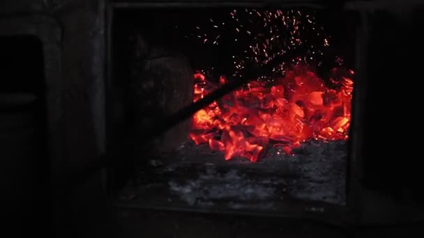 Coals in the furnace goes through with a fireplace — Stock Video