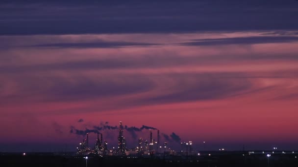 Operating factory with smoking chimney against at winter dawn. dawn. environment, flying birds — 비디오