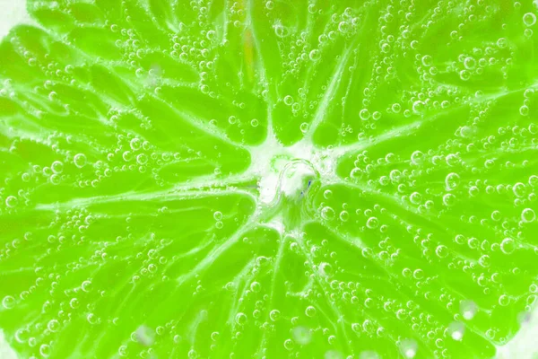 Πράσινο Φόντο Εσπεριδοειδή Φρούτα Από Φέτες Ασβέστη Κοντινό Πλάνο — Φωτογραφία Αρχείου