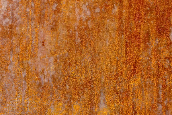 old rust rusted metal wall. Old Rusty background with streaks of rust. Rust stain.