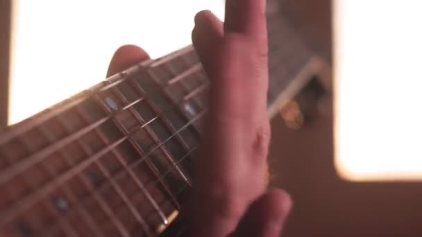 Man playing guitar on a stage. Musical concert. Close-up — Stock Video