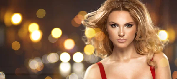 Glamorous blonde beauty on fantasy background — Stock Photo, Image