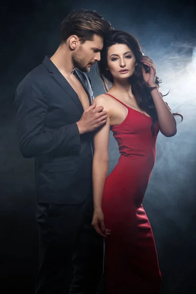 Sexy elegant couple. Woman wear re dress — Stock Photo, Image