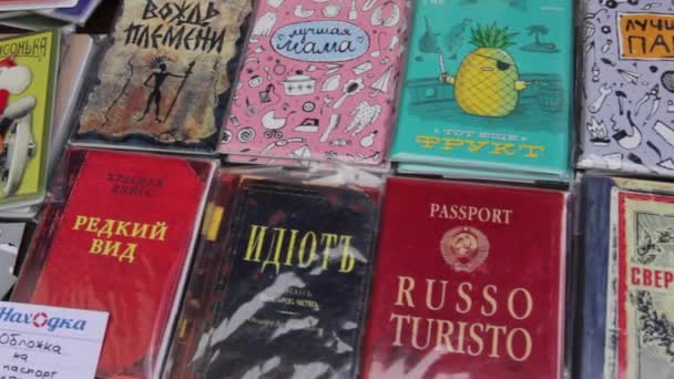 Russia Vladivostok may 25 2019-street market, different covers for documents — 비디오