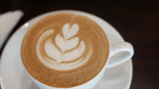 Pouring stream milk into a cup of espresso, slow motion. Close-Up. Stock footage. — Stock Video