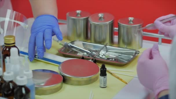 Woman Dentist Treating Teeth to Woman Patient in Clinic. Female Professional Doctor Stomatologist at Work. Concept Dental Check Up. — Stock Video