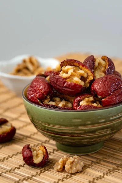 Dry Red Jujubes Walnuts Green Bowl — Stock Photo, Image