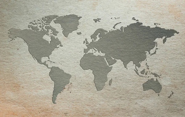 Scherenschnittkarte der Welt auf Altpapier — Stockfoto