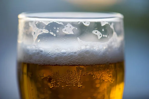 White foam in glass, close-up picture of beer — Stock Photo, Image