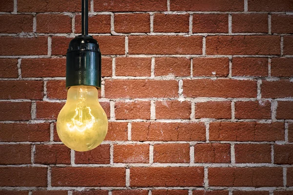Brown brick wall with bulb lights lamp
