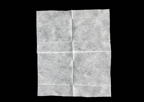 Nasse Serviette oder weißes Papier isoliert auf schwarzem Hintergrund für Ideen — Stockfoto