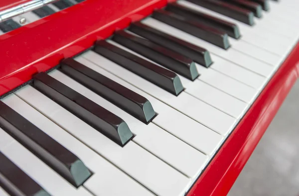 Piano keys, red Piano, close-up of piano keys