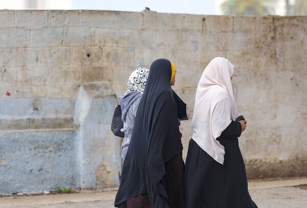 Three muslim women walking in Casablanca