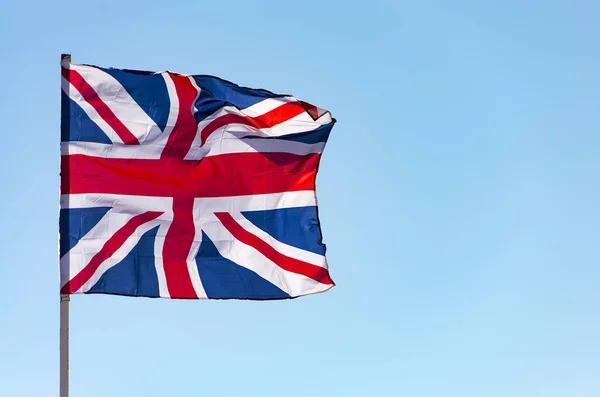 Londen Groot Brittannië Vlag Zwaaien Tegen Blauwe Hemel Vlag Britse — Stockfoto
