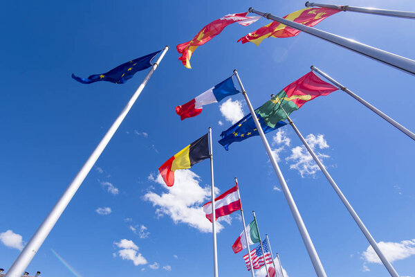 Rows of European flags and flags of the World countries 