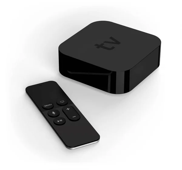 stock image Tv player box device with remote wireless pilot. High detailed.