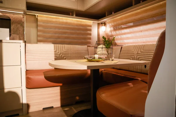 Interior of luxury caravan. Detail photo of coach with equipment