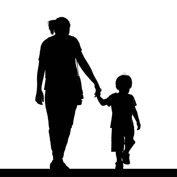 Silhouet van een moeder die haar zoon op wit wordt geïsoleerd te houden — Stockfoto