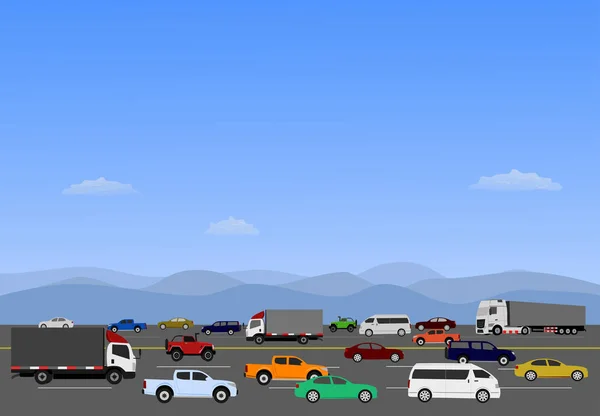 Many cars are driving on highways with mountains and blue sky in the background.