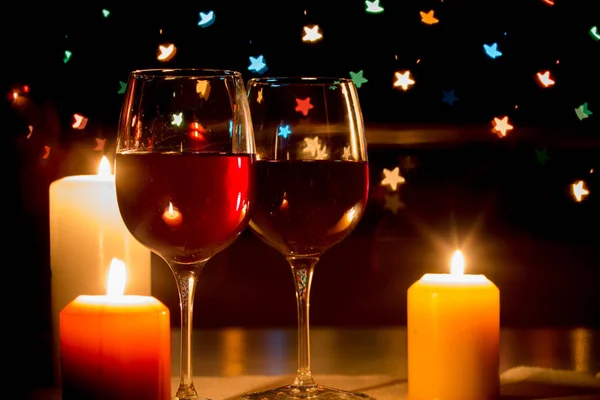 Wine glass on hearts bokeh background — Stock Photo, Image