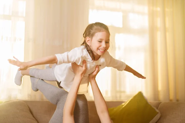 Mum and her cute daughter child girl are playing, smiling and hugging. Happy mother's day. — Stock Photo, Image