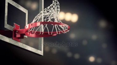 Bir basketbol halka sarı spot arka plan üzerine atmak
