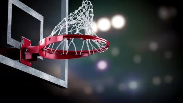 Хороший бросок в баскетбольное кольцо на фоне прожекторов — стоковое видео