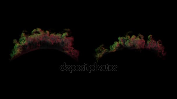 La cámara mira desde arriba mientras una onda expansiva de color rojo y verde diverge alrededor, arremolinando humo — Vídeos de Stock