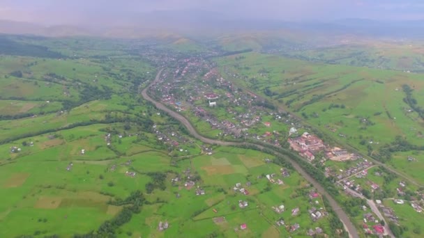 Aerial panoramic view. village in river valley — Stock Video